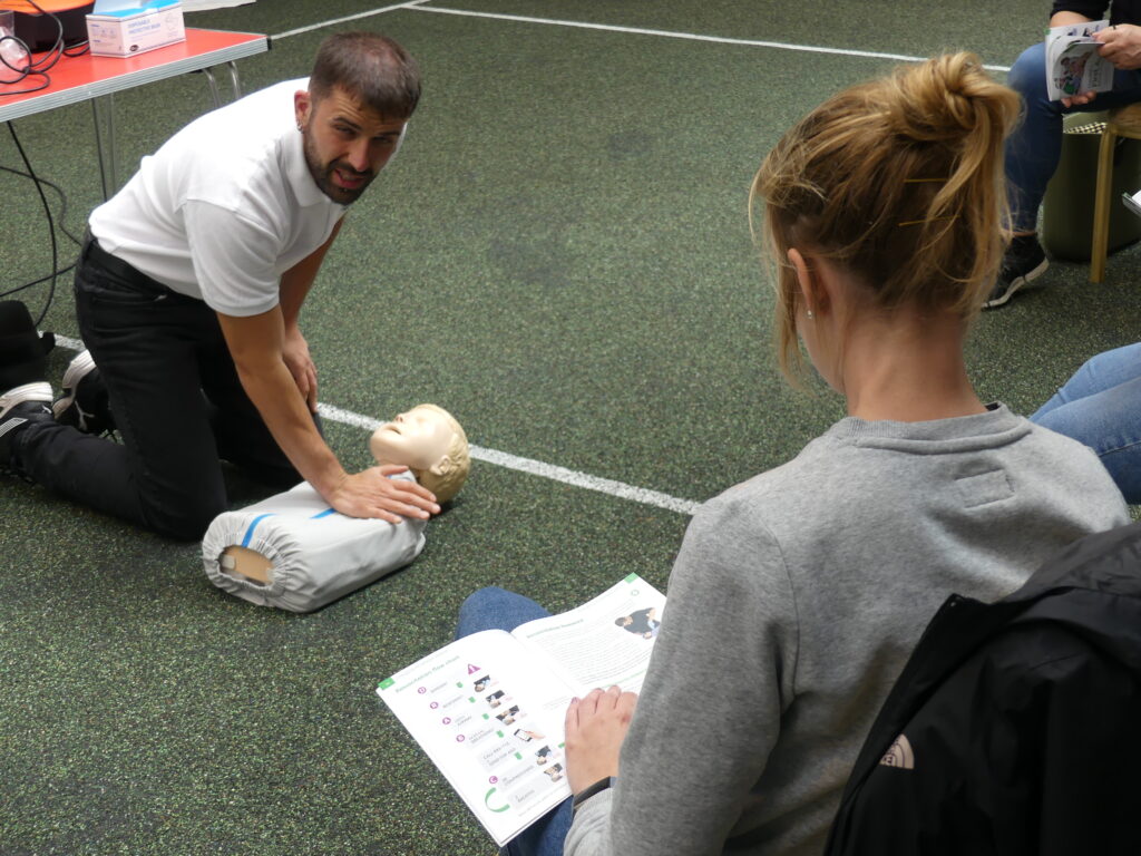 Frontline Training Instructor demonstrating child CPR